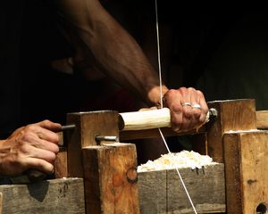 Woodworker turning a piece of wood